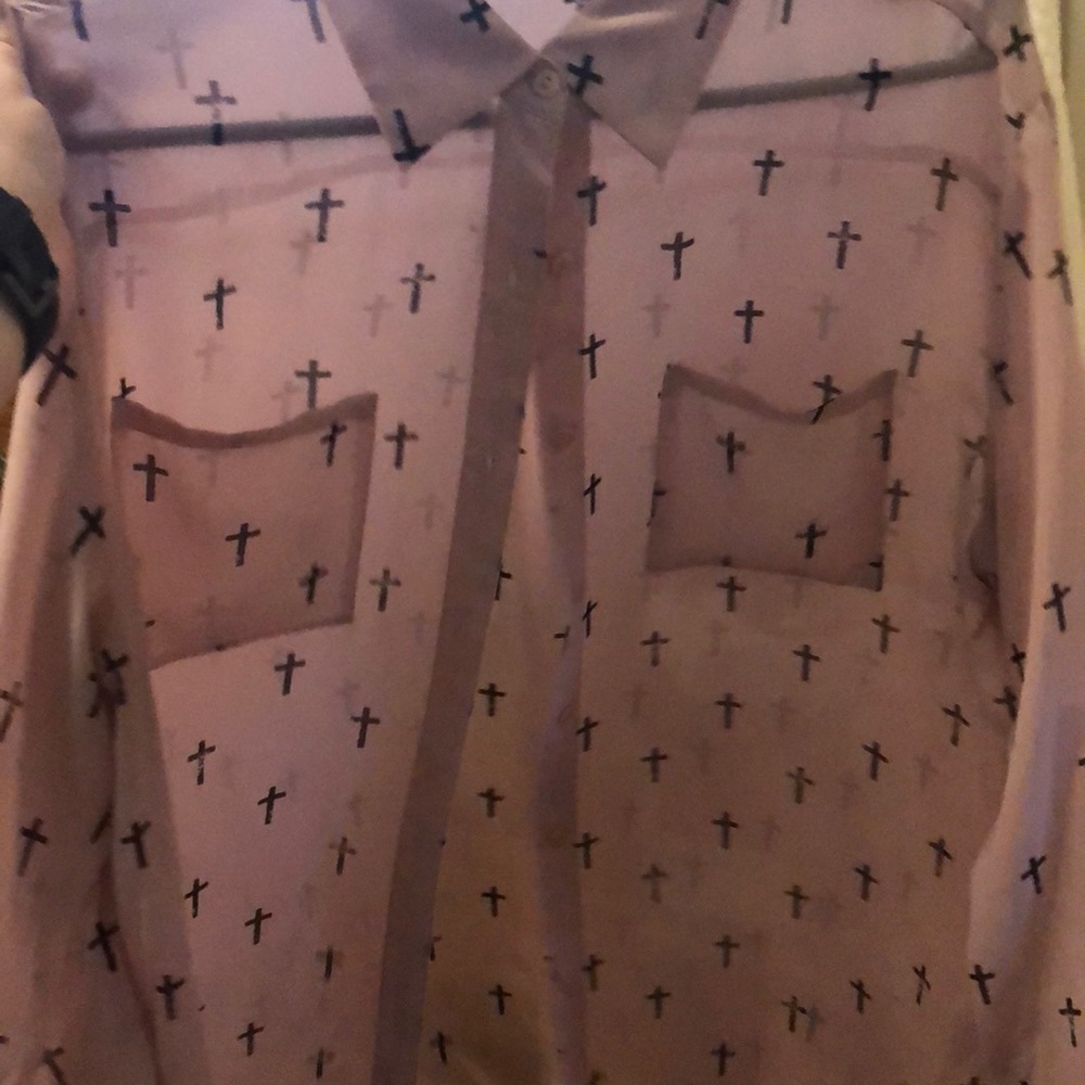Blush pink blouse with crosses.